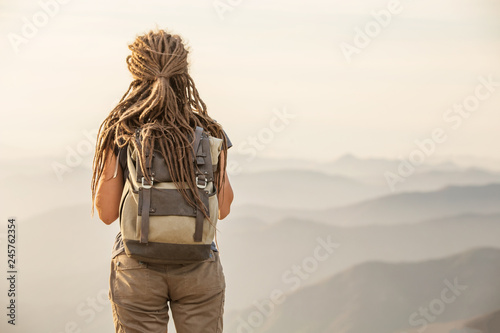 Hiker meets the sunset on the Moro rock in Sequoia national park, California, USA. photo