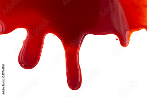 Dripping blood isolated on white background. Flowing red blood splashes, drops and trail.