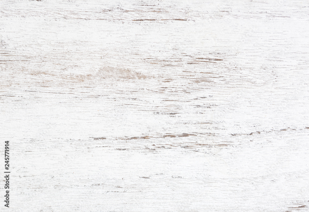 Grunge background. Peeling paint on an old wooden table. White wooden texture for background. Top view.