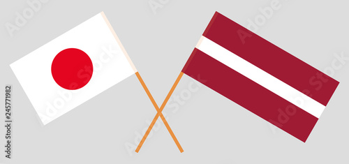 Latvia and Japan. The Latvian and Japanese flags. Official colors. Correct proportion. Vector