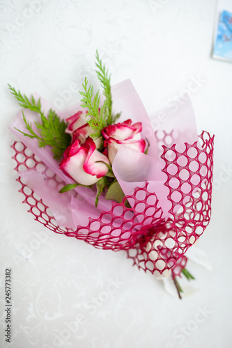 decorated bouquet of white pink roses