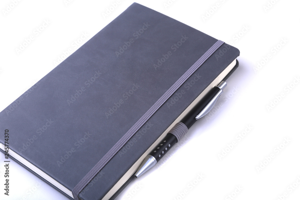 office table with notebook and pen. copy space. office table with notebook and pen. copy space.