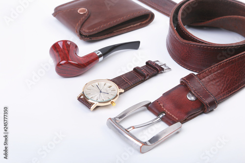Men's accessories for business and rekreation. A professional studio photograph of men's business accessories. Top view composition