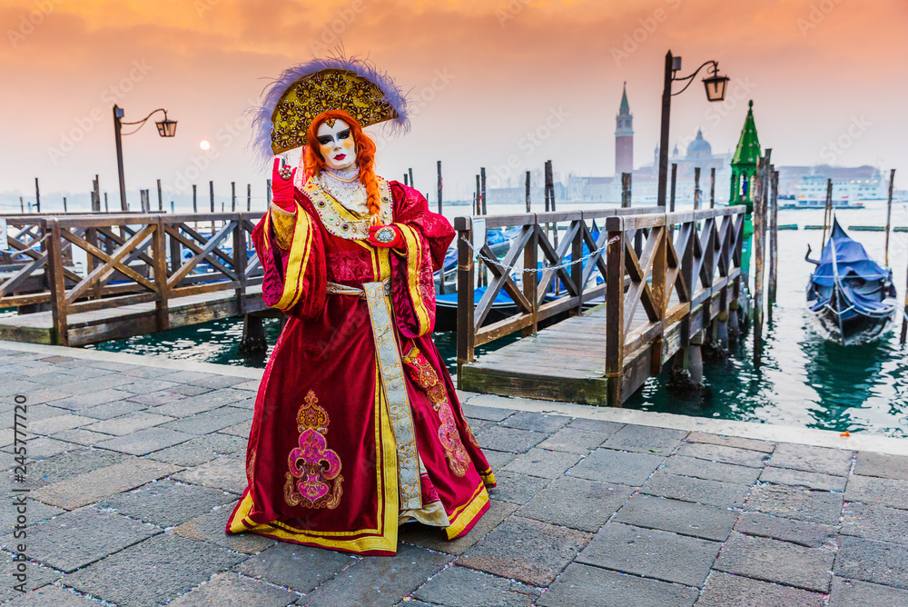 Venice, Italy. Carnival of Venice, beautiful mask at St. Mark's Square.