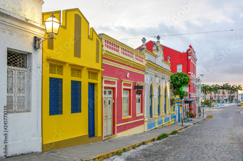 The historic architecture of Olinda in Pernambuco, Brazil with its colonial buildings and cobblestone streets at sunset.
