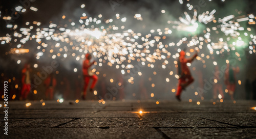 Принти на полотні Typical Correfocs of Catalonia, a type of fireworks managed by men dressed as de