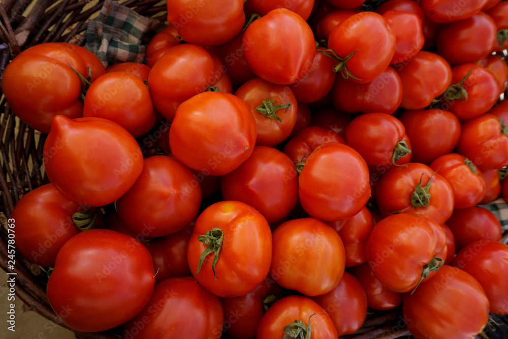 A basket of fresh tomatoes for sale at an Astoria, Oregon outdoor market.
A basket of fresh tomatoes for sale at an Astoria, Oregon outdoor market.