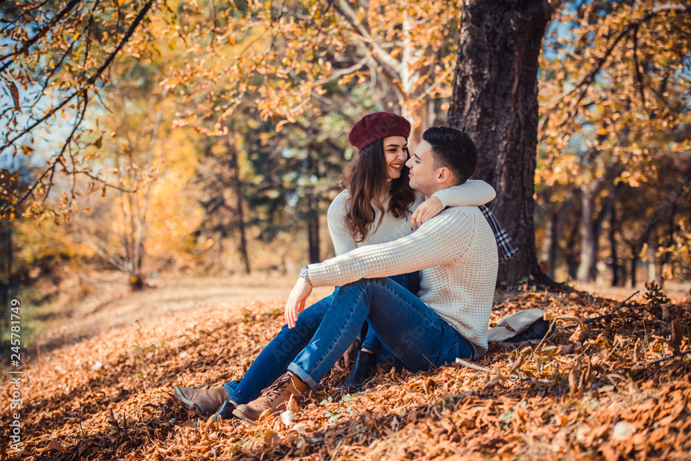 Classy couple hugging in the park Classy couple hugging in the park