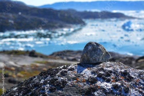 Ilulissat  Greenland  July   UNESCO world heritage site   impressions of Jakobshavn   Disko Bay Kangia Icefjord   huge icebergs in the blue sea on a sunny day   climate change - global warming