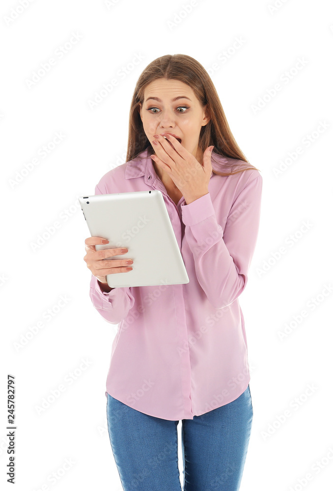Emotional young woman with tablet celebrating victory on white background Emotional young woman with tablet celebrating victory on white background