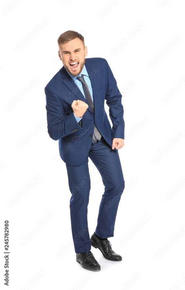 Young businessman celebrating victory on white background Young businessman celebrating victory on white background