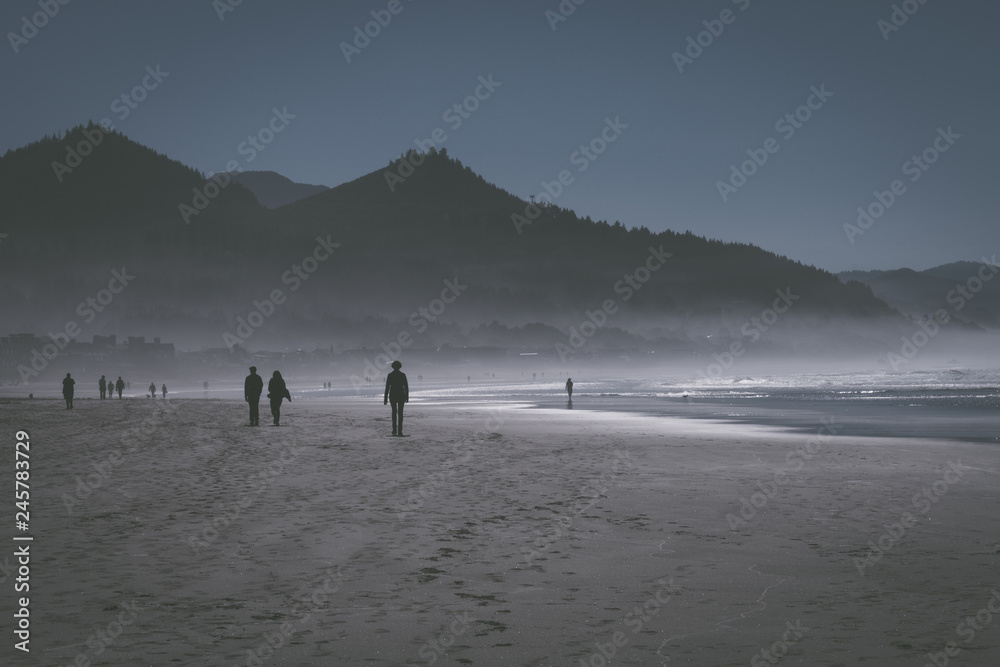 The ocean mist enters at sunset in Cannon Beach, Oregon, USA.