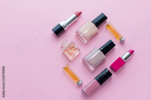 Professional makeup isolated on pink background. Flat composition. magazines, social media. Top view. Flat lay. Beauty concept.Decorative cosmetic products.collection. Fashion trends in cosmetics with
