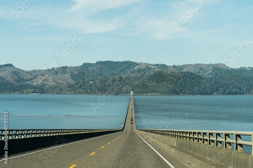 Columbia River at its mouth crossed by the Astoria - Megler Bridge in Astoria, USA photo