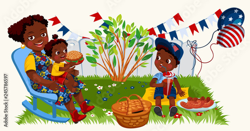 Latino american mother with kids enjoying picnic in garden