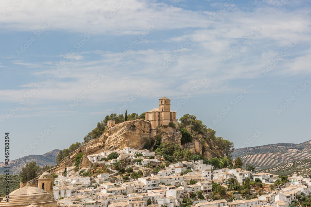 Beautiful cityscape with castle on hill in Montefrio in Spain