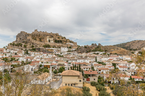 A close up view of the church above the town of Montefrio  Spain in summertime