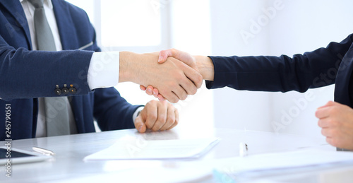 Wallpaper Mural Group of business people or lawyers shaking hands finishing up a meeting , close-up. Success at negotiation and handshake concepts Torontodigital.ca