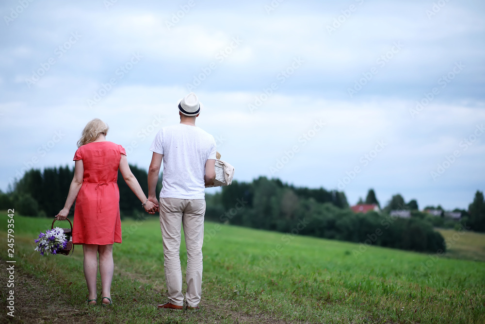 Pregnant girl with big belly and young man outdoor Pregnant girl with big belly and young man outdoor