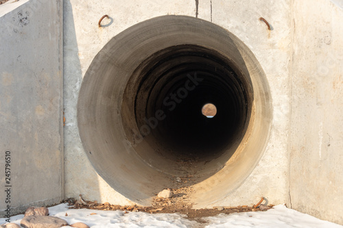 Drainage, sewer pipes, concrete pipes, leading water under the road