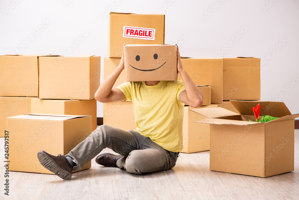 Happy man with box instead of his head Happy man with box instead of his head