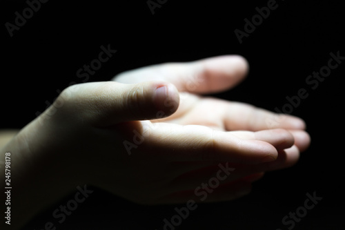 Ramadan kareem concept: Black and white prayer hands open two empty hands with palms up to pray God