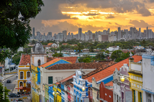 The historic architecture of Olinda in Pernambuco, Brazil with its colonial buildings and cobblestone streets at sunset.