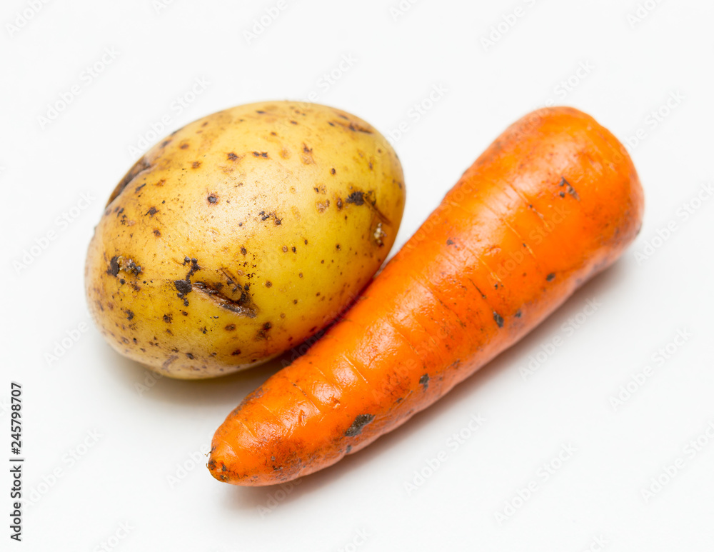 potatoes and carrots on white background potatoes and carrots on white background