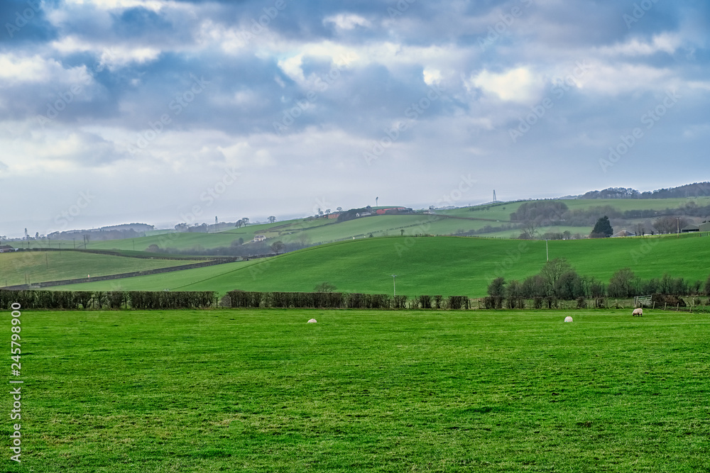 Ayrshire Fields in Scotland as the Rain moves in Over the Far Hillside. Ayrshire Fields in Scotland as the Rain moves in Over the Far Hillside.