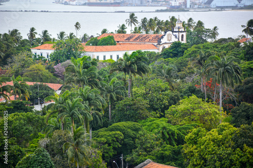 The historic architecture of Olinda in Pernambuco, Brazil with its colonial buildings and cobblestone streets at sunset.