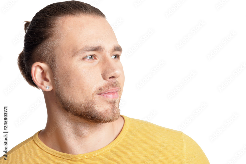 Obraz premium Portrait of young man posing on white background