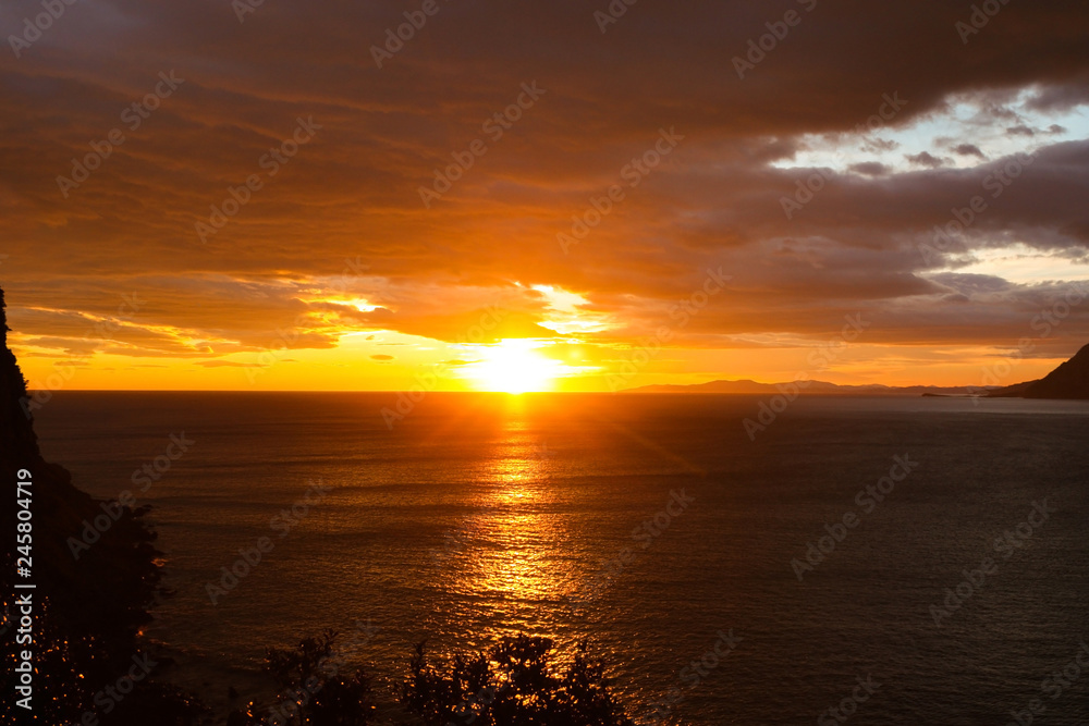 Cloudy coastal sunrise scene in Santona, North Spain