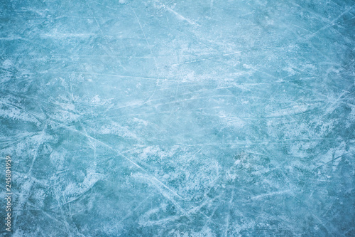Blue ice in skate scratches, close view