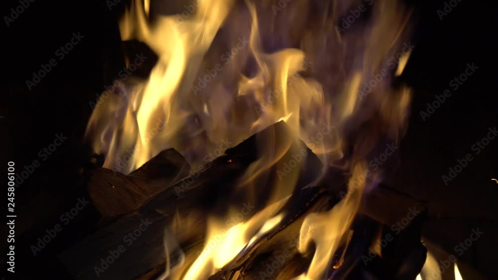 A fire burns in a brick fireplace, keep warm A fire burns in a brick fireplace, keep warm