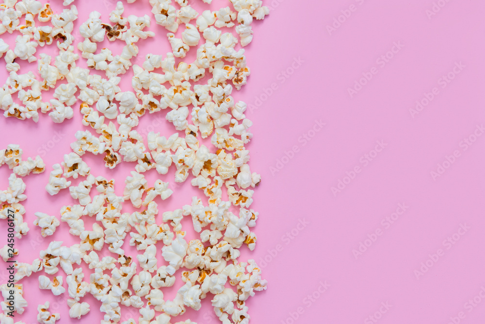 Popcorn pattern on pink background. Top view Popcorn pattern on pink background. Top view