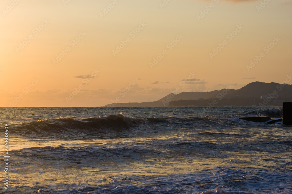 Amazing sea sunset, the sun, waves, clouds