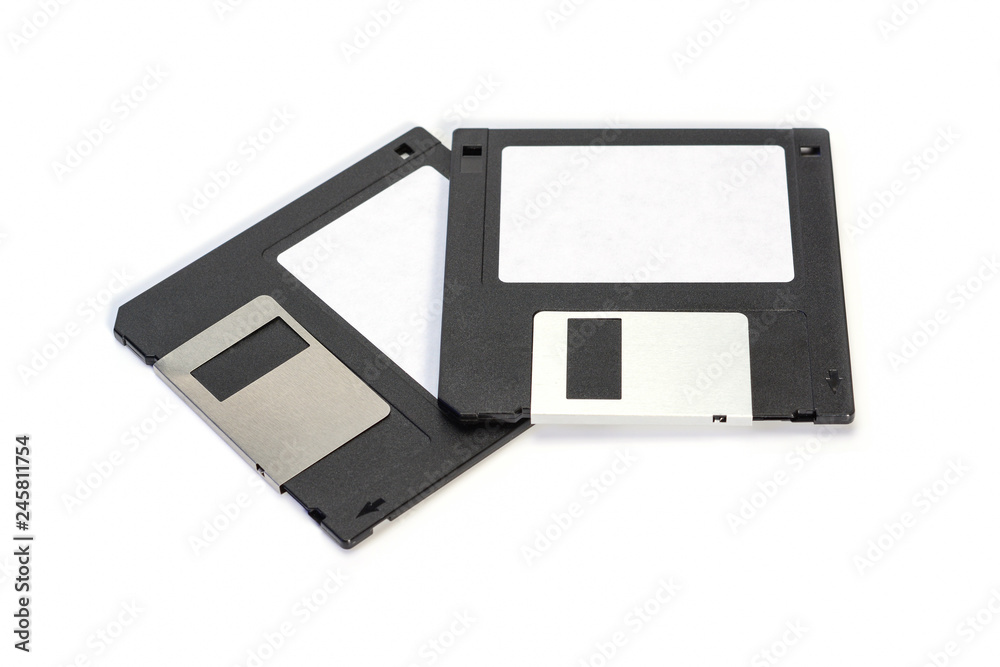 Floppy disk 3.5 inch isolated on white backround. Two vintage computer diskette front view. Floppy disk 3.5 inch isolated on white backround. Two vintage computer diskette front view.