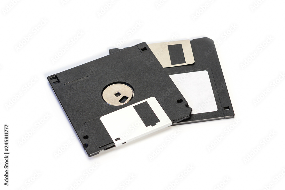 Floppy disk 3.5 inch isolated on white backround. Two vintage computer diskette back and front view. Floppy disk 3.5 inch isolated on white backround. Two vintage computer diskette back and front view.