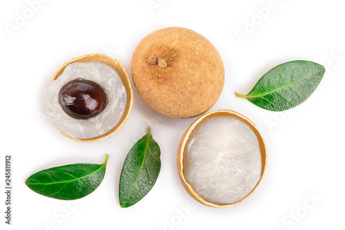 Fresh longan fruit with leaves isolated on white background. Top view. Flat lay