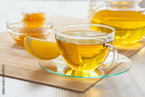 Herbal tea served with honey and lemon