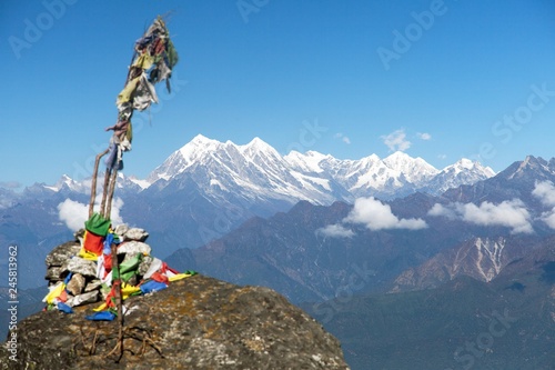 buddhist prayer flags and great himalayan ridge, Nepal