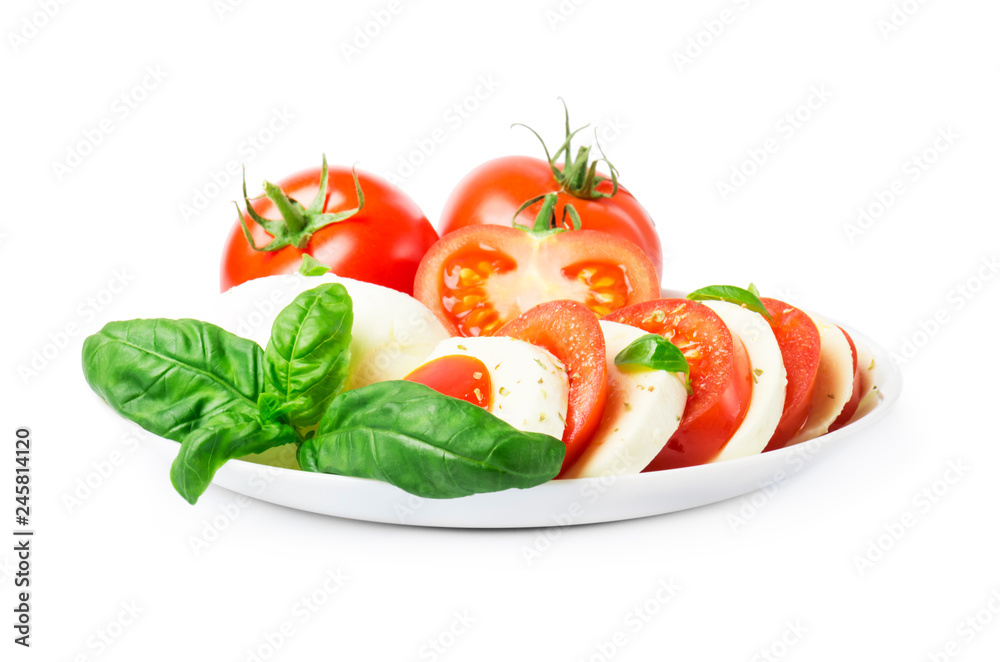 Сaprese salad with ripe tomatoes and mozzarella cheese with fresh basil leaves. Italian food. Сaprese salad with ripe tomatoes and mozzarella cheese with fresh basil leaves. Italian food.