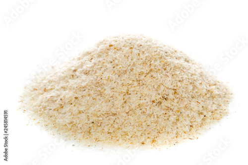 Heap of psyllium husk also called isabgol over white background