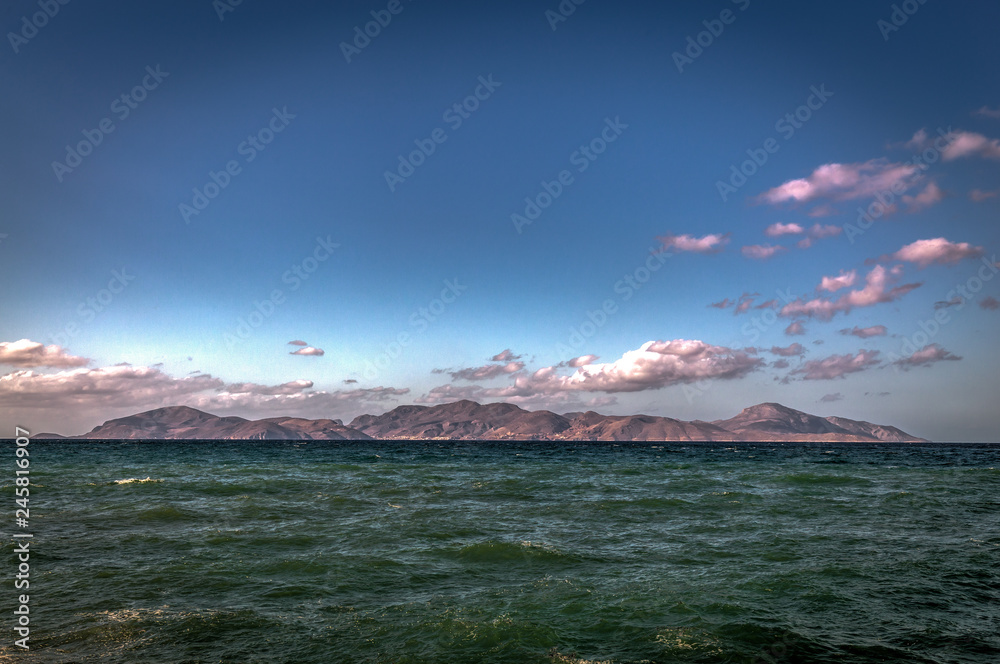 Sunny view from Alikes beach near Tigaki to island of Pserimos. Island of Kos, Greece