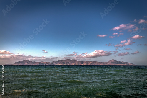 Sunny view from Alikes beach near Tigaki to island of Pserimos. Island of Kos, Greece © Martin