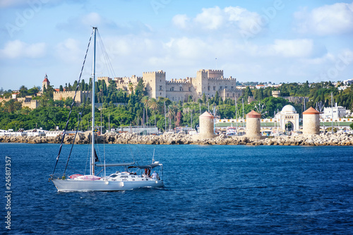 Sail boats in front of Grand Master palace in City of Rhodes (Rhodes, Greece)