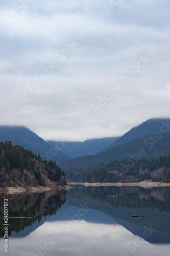 Mountain lake, calm with glass reflection