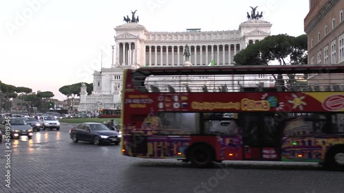 Rome, Italy. Piazza Venezia. Evening. Traffic. View of the Altare della Patria.