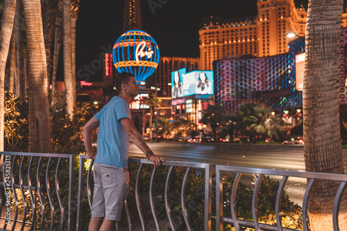 Photography Young man exploring the strip of Las Vegas at night