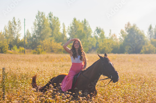 beautiful girl, brunette on horseback riding